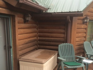 The overhangs on these converging roofs was inadequate to prevent water from splashing back on the logs and causing rot.