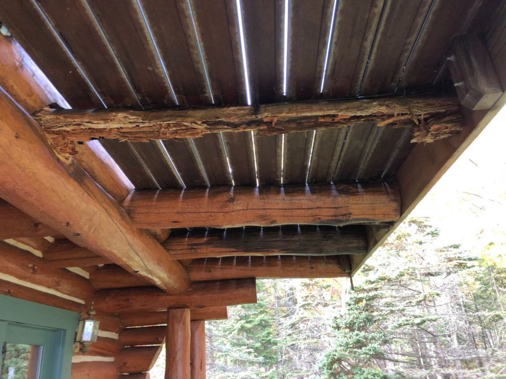Underneath view of rotting cantilever supports