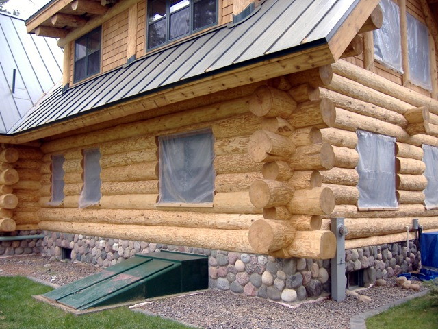A freshly sand blasted log home.