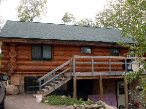The finish product of a cleaned and stained log home