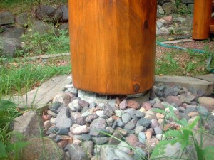 Spacers under log posts