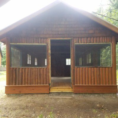 small vertical log cabin