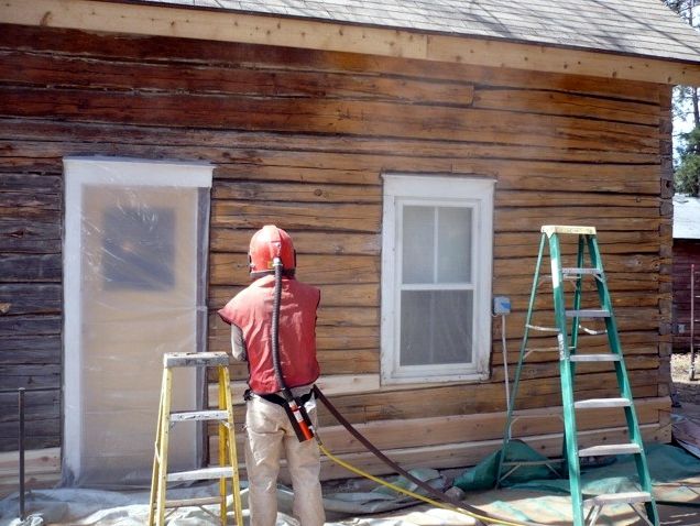 Blasting off old log stain