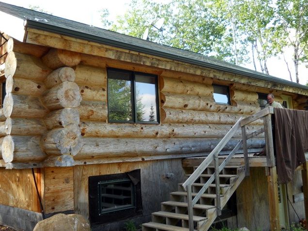 Cleaned log home before staining