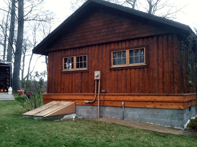 Restored vertical log home