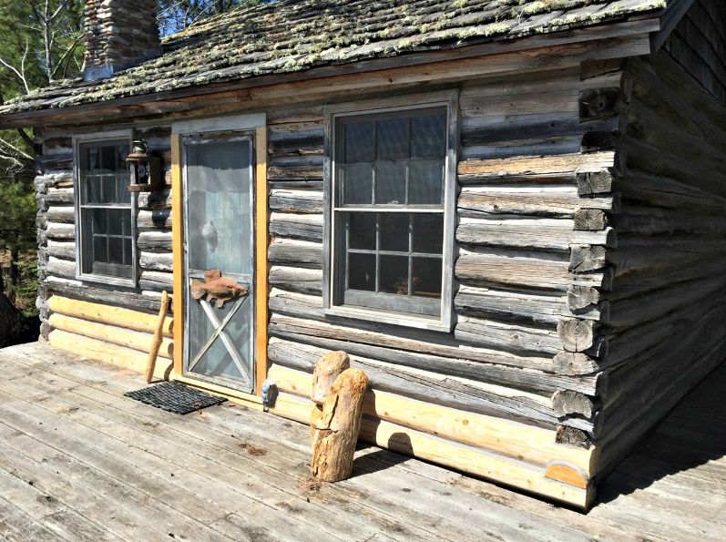 Classic log cabin with replacement logs